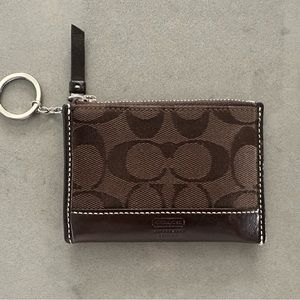 brown coach wallet with keychain